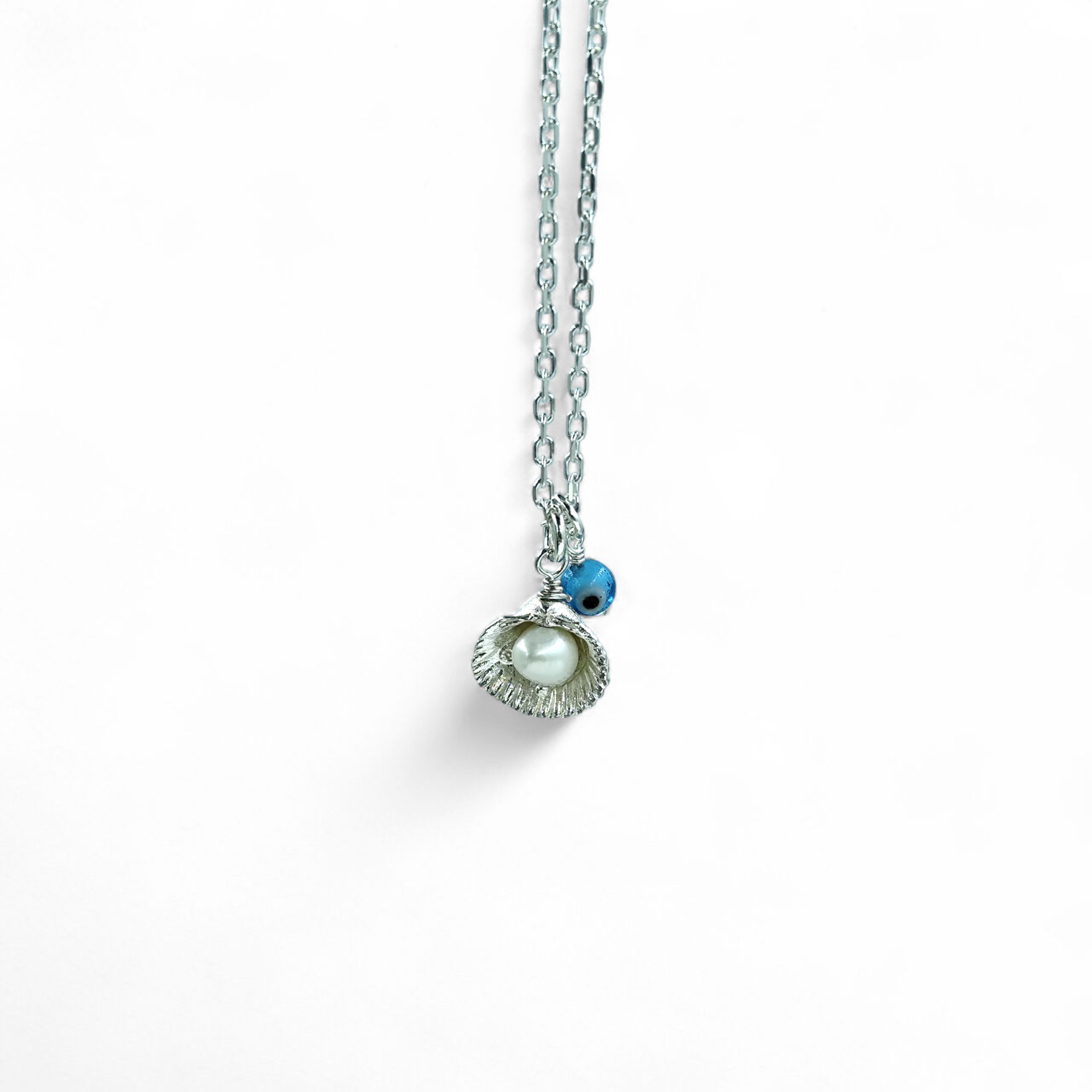 IMG_20251118_102844 ΓΟΥΡΙ-φυλαχτό αυτοκινήτου shell με ματάκι από ασήμι 925° - Image 1